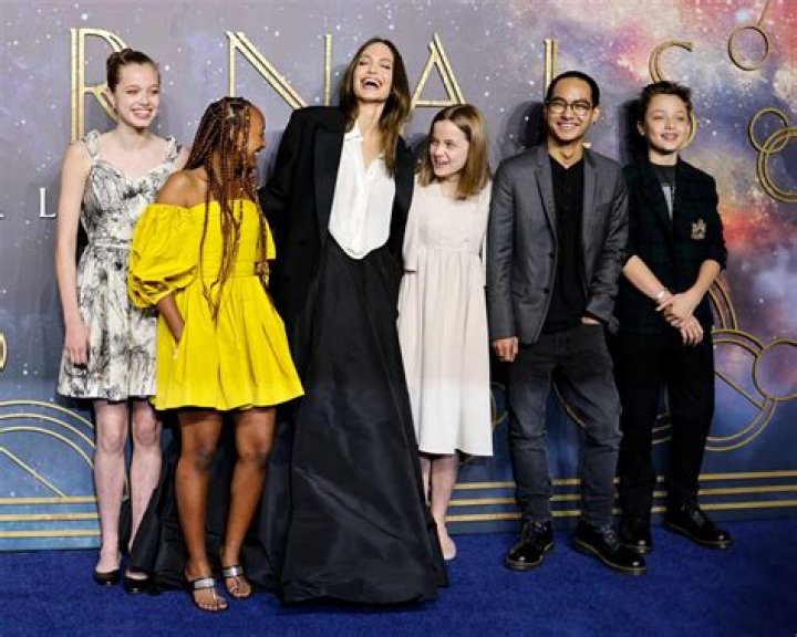 23 Best Pics Of Angelina Jolie & Her Kids: Red Carpets, Shopping Trips & More