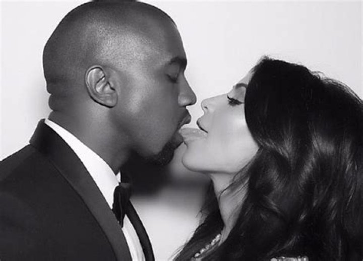 Kim Kardashian & Kanye West Share Steamy Tongue Kiss In Old Wedding Pic
