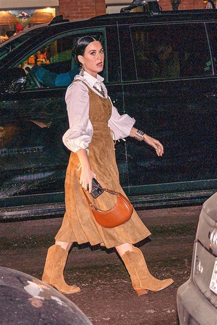 Katy Perry Rocks Cowboy Boots With her Dress While Out With Orlando Bloom in Aspen