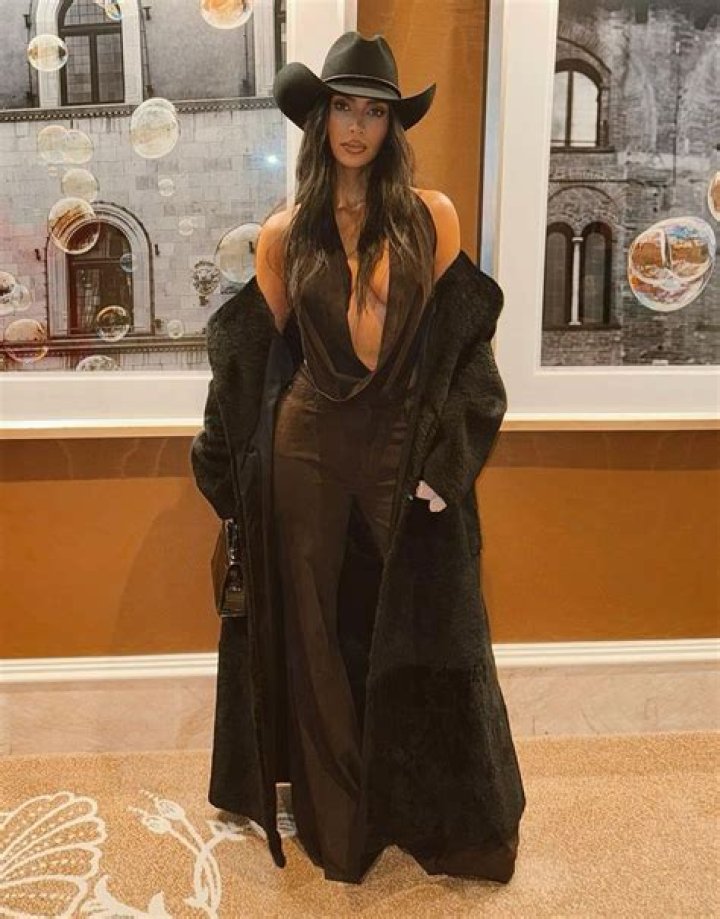 Kim Kardashian Stuns in Racy Plunging Top & Cowgirl Hat While Hanging With La La Anthony & Khloe Kardashian