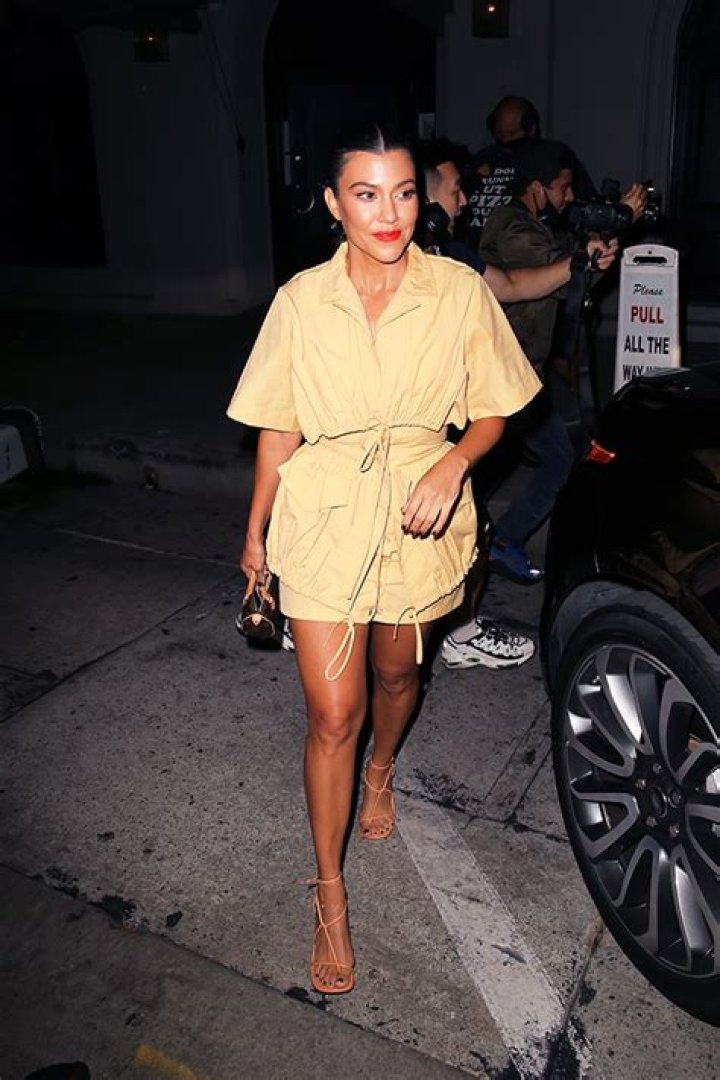 Kourtney Kardashian Rocks Flirty Mini Dress For Fun Night Out After Discussing Baby No. 4 With Scott