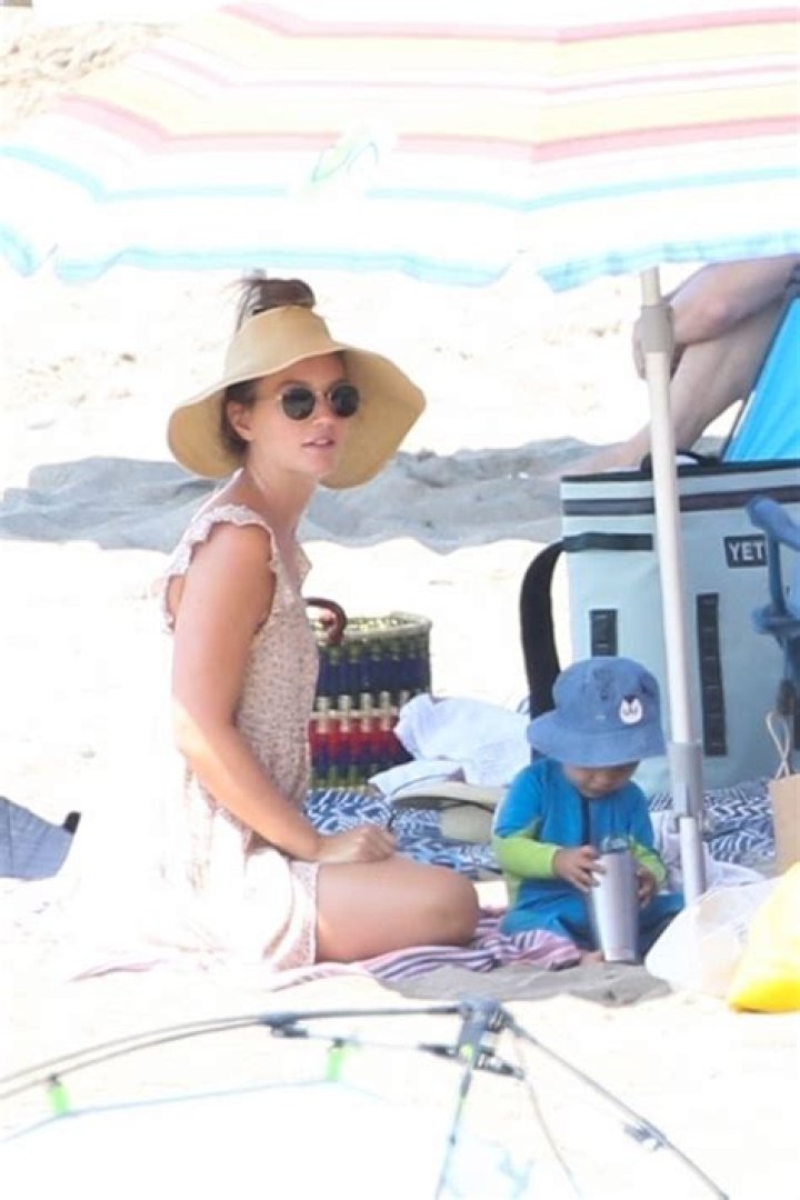 Leighton Meester Cuddles Son, 10 Months & Daughter Arlo, 5, At Malibu Beach — Photos